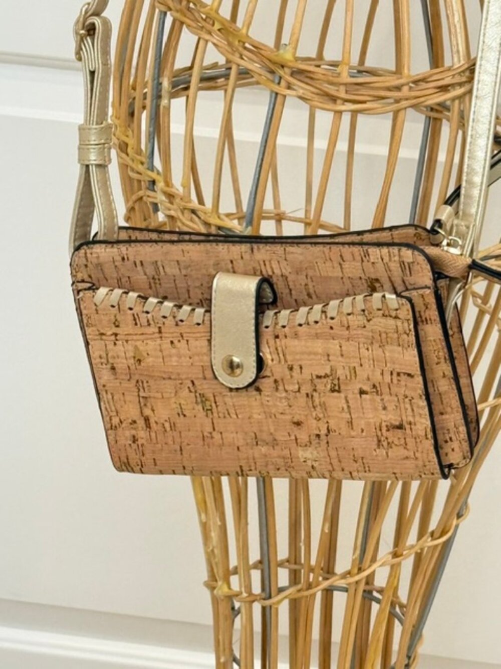 Cork crossbody handbag w/ zipper closure.
